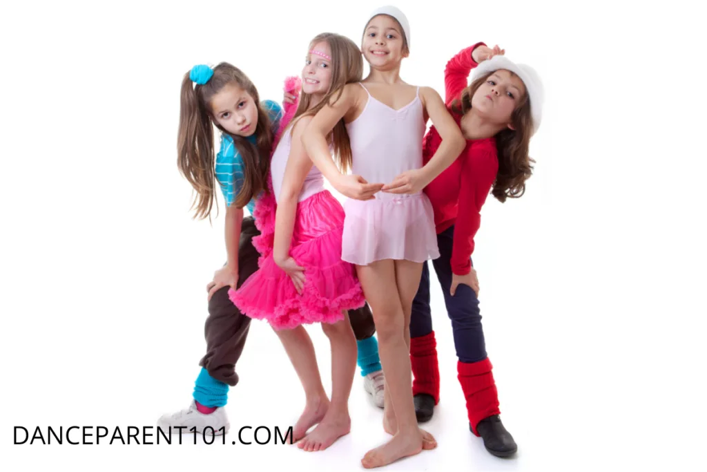 4 kids in different dance wear ballet, musical, hip hop etc dance class
