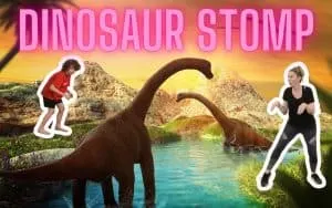 a woman and a boy doing dinosaur stomp with background picture of two dinosaurs in a dino world