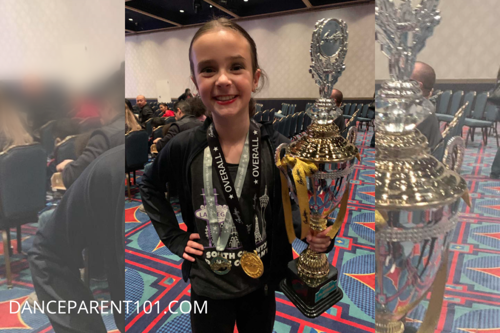Karly's Daughter with her medals and Trophies at a dance competition